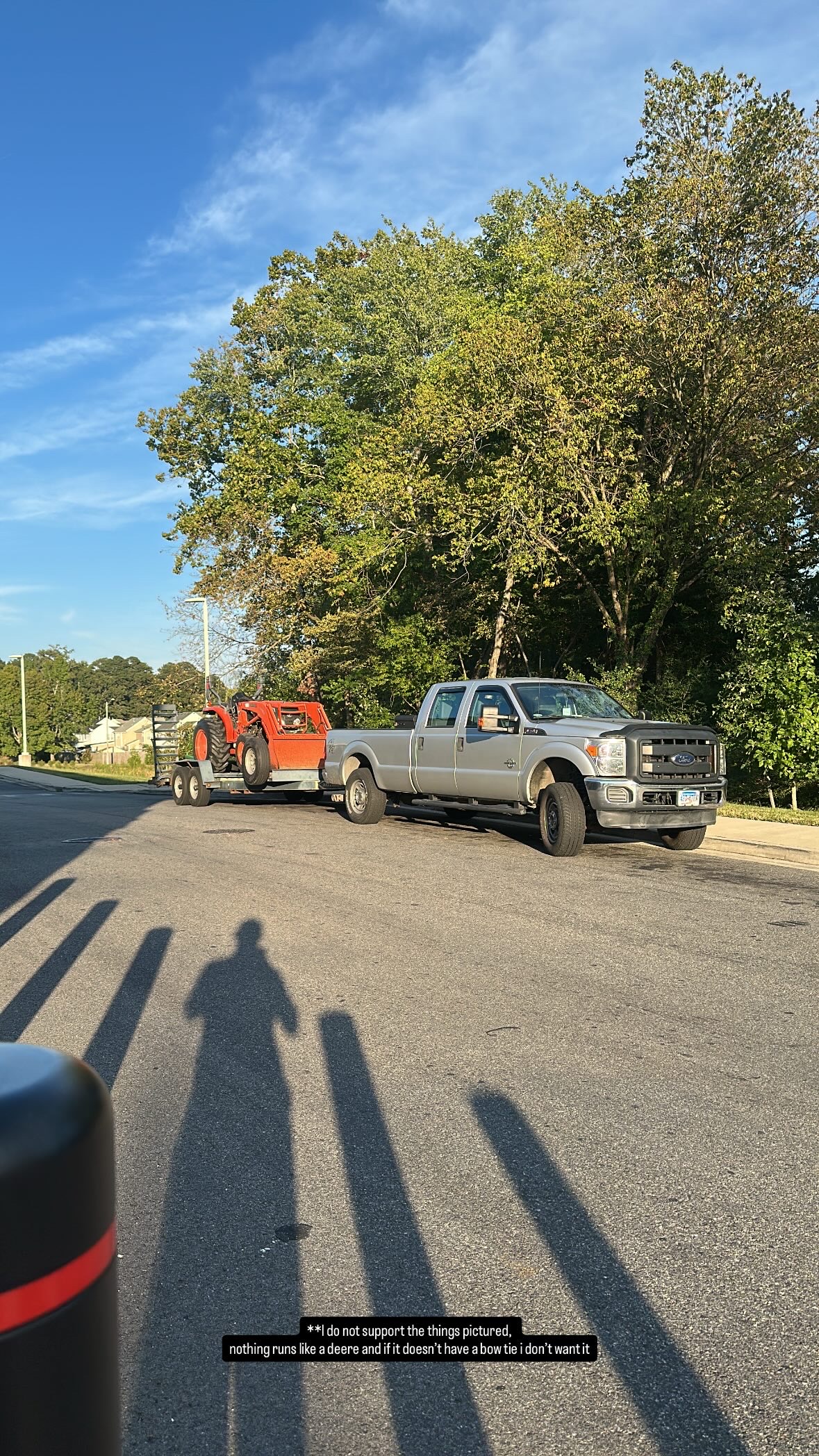 Compact tractor finishing a pass on a cleared property